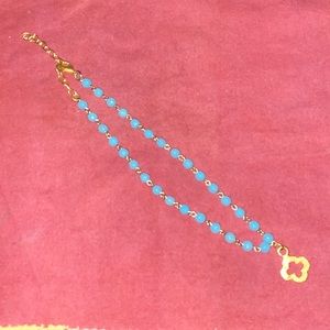 Turquoise beaded necklace with cross pendant